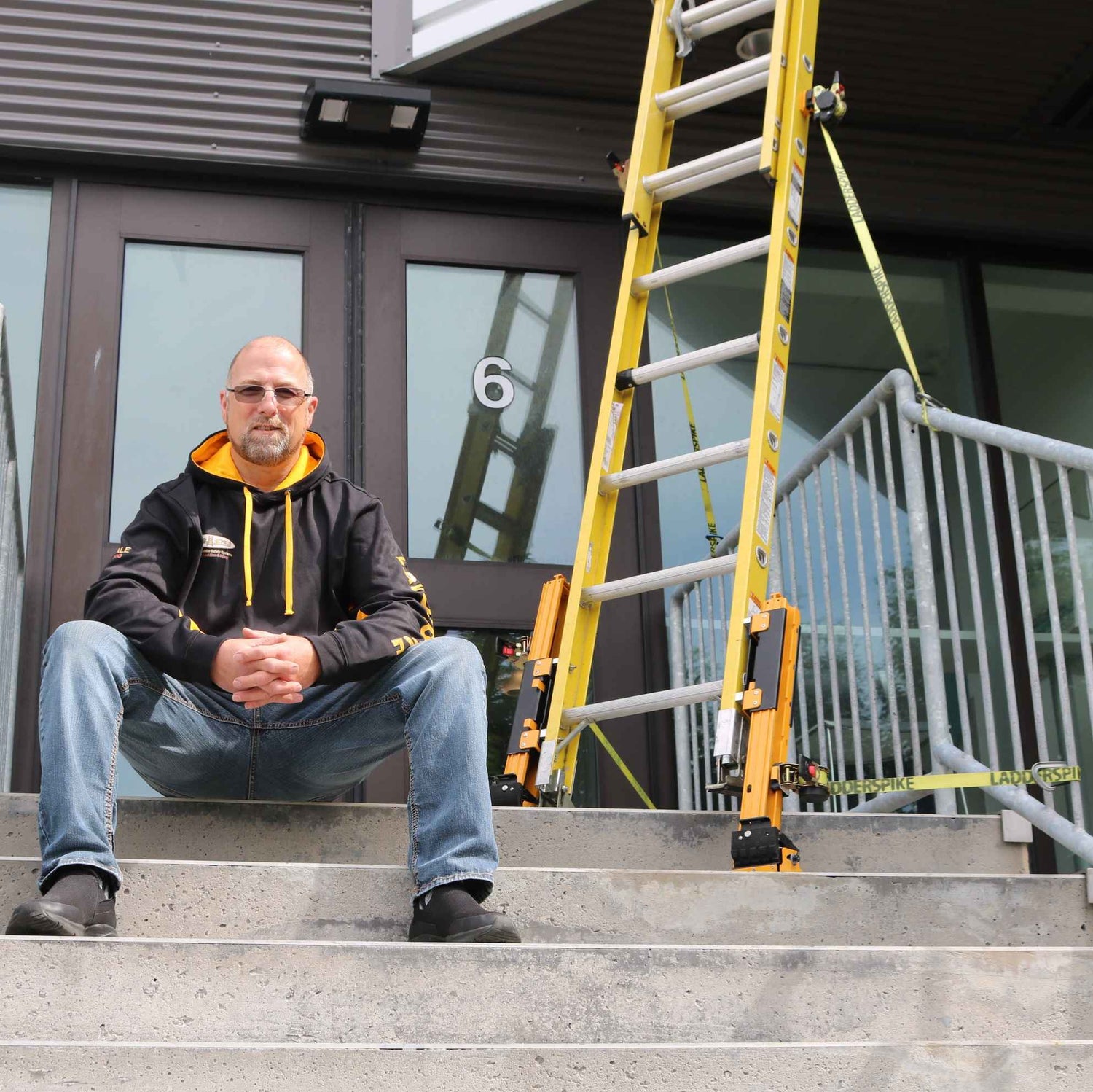 Dale Keen sitting next to his product